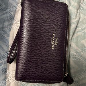 Coach wrislet/phone case